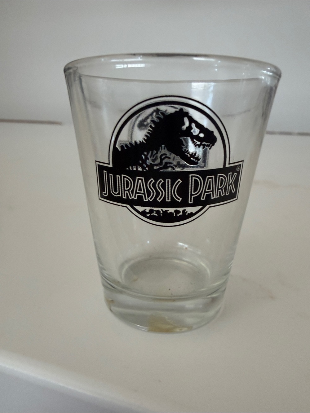 3/$20 Jurassic Park Clear Glass Shot Glass with Black Logo